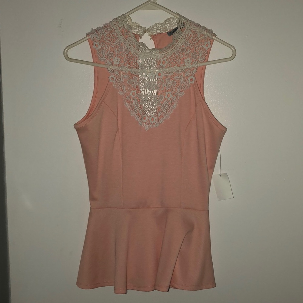 Pink high neck peplum top